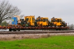 BNSF 927497, BNSF porta-potty (a second in case someone stinks up the first one.), X0100819 Spike Remover, X4700512 & X4700513 Nordco Spike Removers